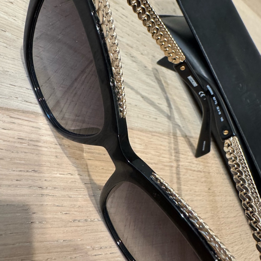 Moschino Women's Sunglasses with Black Frame and Gold Detail - Picture 2 of 3